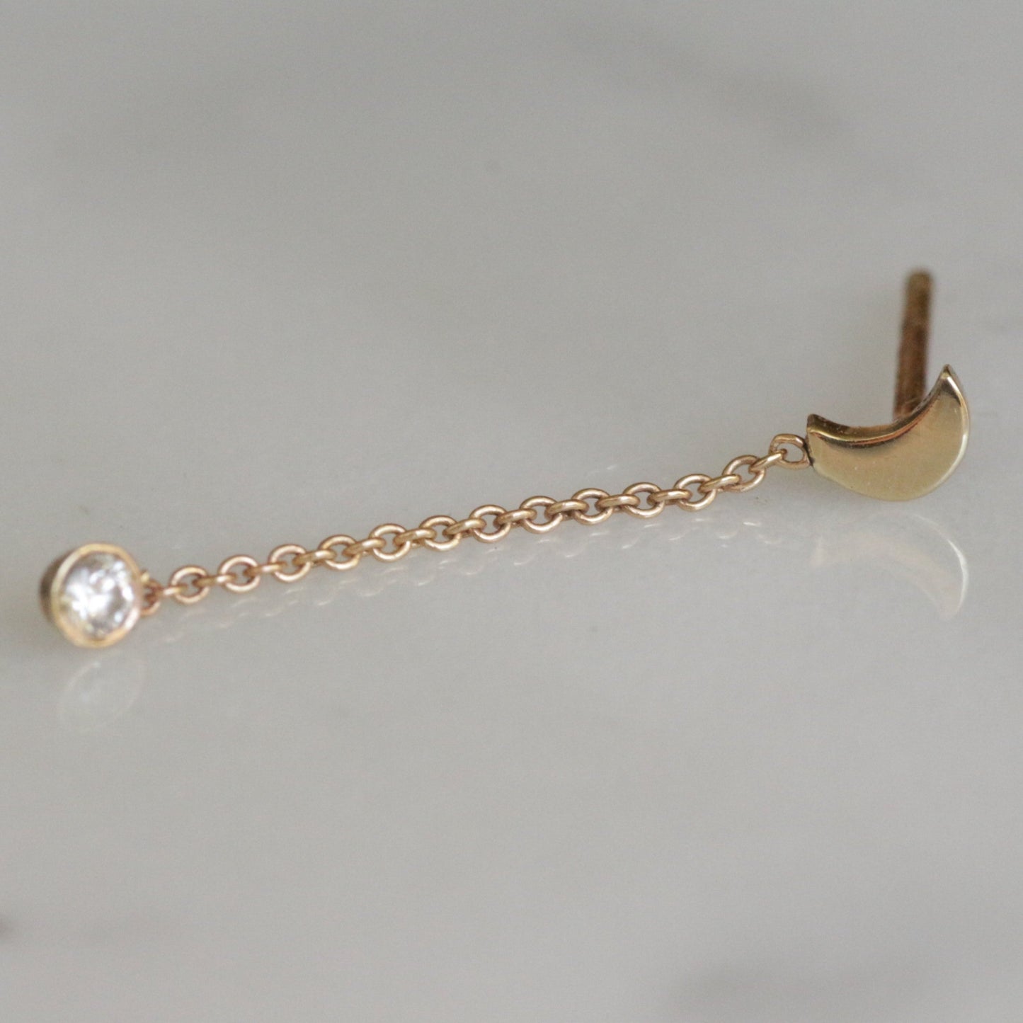 Falling star stud 14k gold