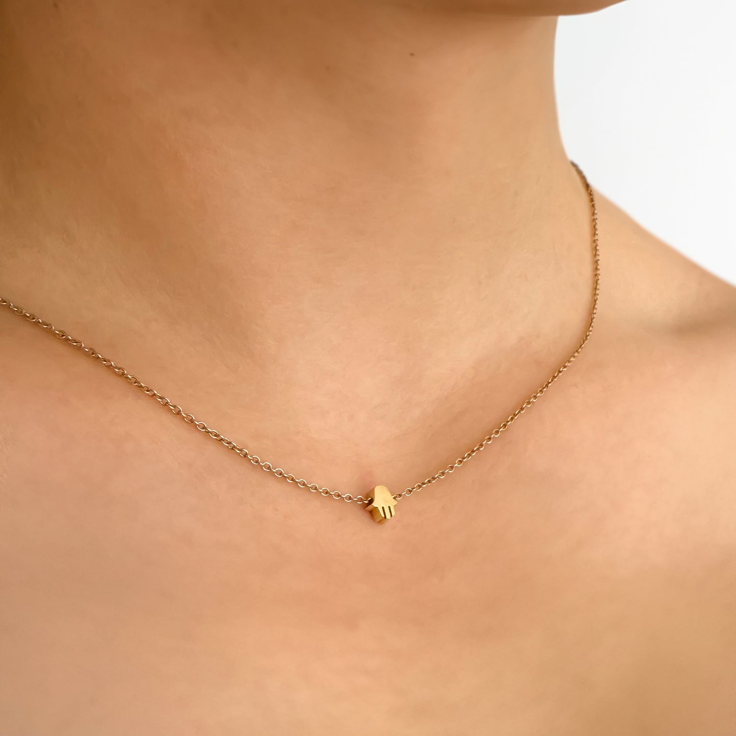 Tiny Hamsa necklace 14k gold