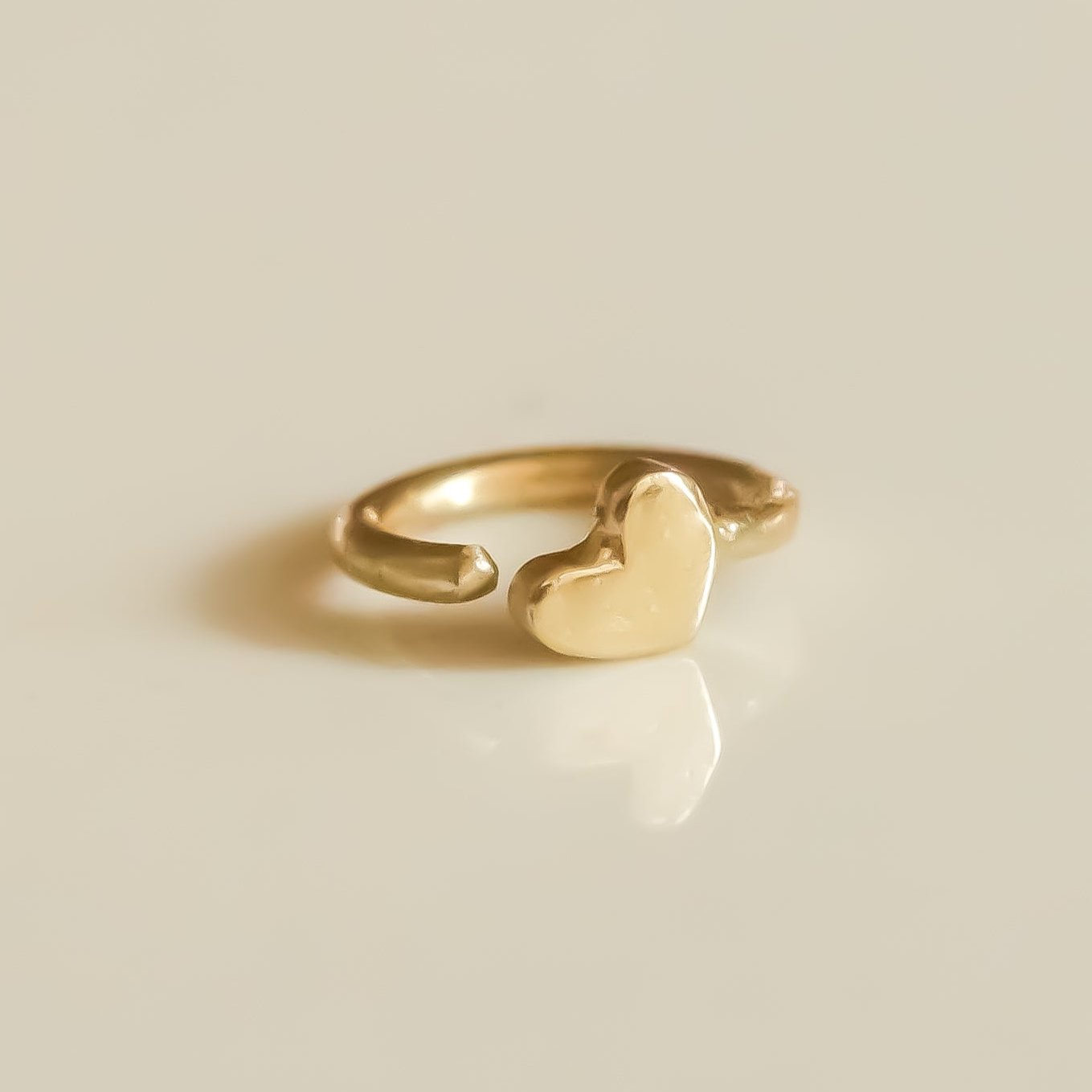 Tiny Helix earring 14k gold